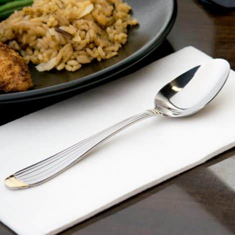 gold trimmed soup spoon