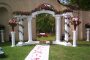 Rent a white colonnade wedding arch at All Seasons Rent All