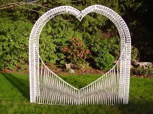 white wicker wedding arch