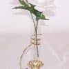 brass and glass bud vase